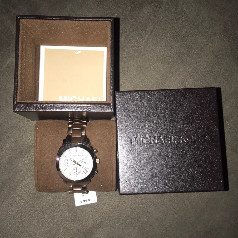Michael Kors rose gold color watch w/ white bezel